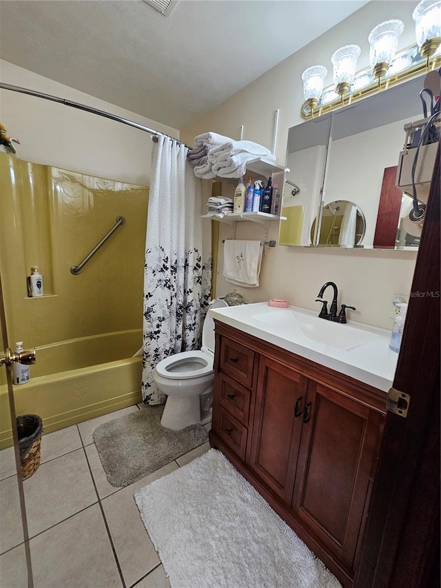 full bathroom with tile patterned flooring, shower / bath combo, vanity, and toilet