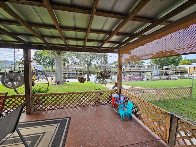 view of patio / terrace featuring a water view