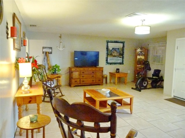 living room featuring light tile patterned floors