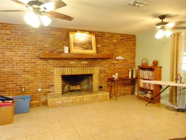 living room with a fireplace, ceiling fan, and brick wall