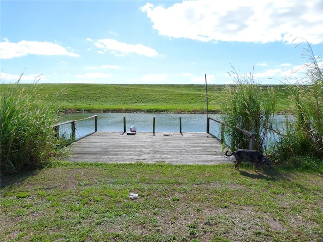 view of dock featuring a water view and a rural view