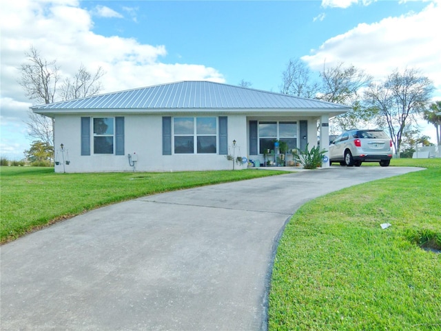 ranch-style home with a front lawn