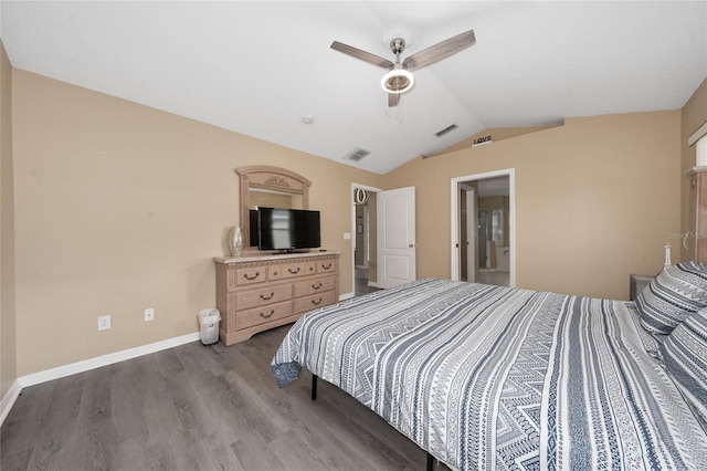 bedroom with ceiling fan, dark hardwood / wood-style flooring, and vaulted ceiling