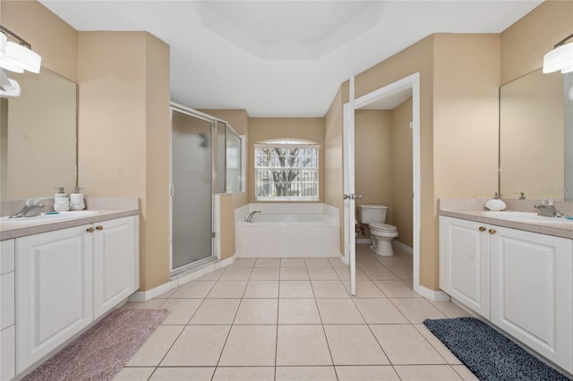 full bathroom featuring tile patterned floors, toilet, and shower with separate bathtub