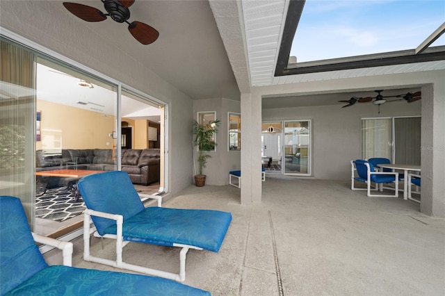 view of patio / terrace featuring ceiling fan