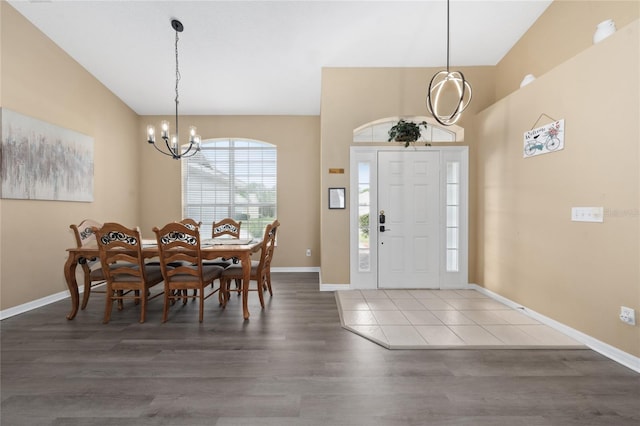 foyer featuring dark hardwood / wood-style floors and a notable chandelier