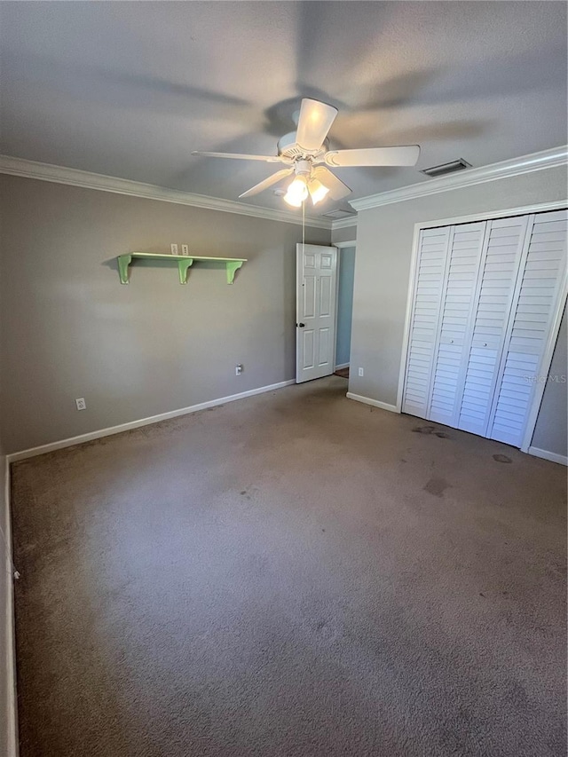 unfurnished bedroom with carpet, ceiling fan, and ornamental molding