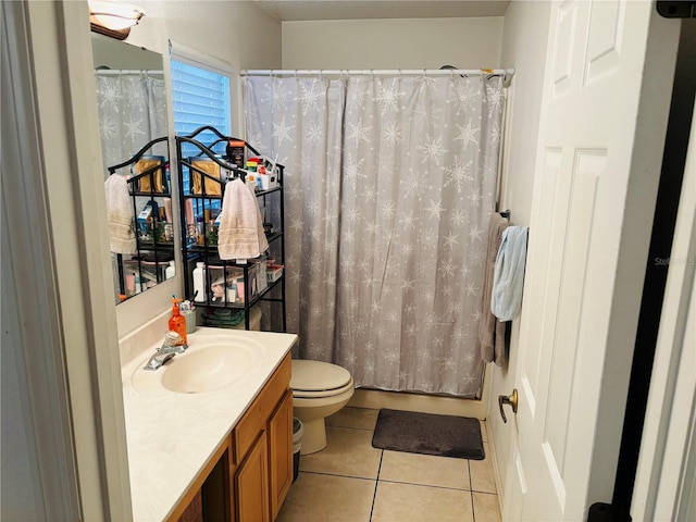 full bathroom featuring tile patterned floors, vanity, shower / bath combination with curtain, and toilet