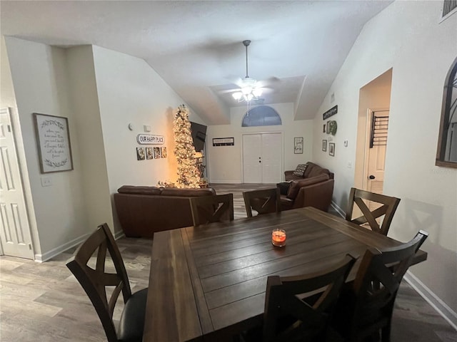 dining room featuring vaulted ceiling and ceiling fan