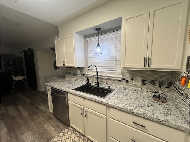 kitchen featuring sink, tasteful backsplash, dark hardwood / wood-style flooring, stainless steel dishwasher, and decorative light fixtures