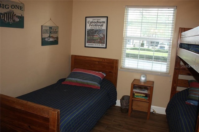 bedroom featuring dark hardwood / wood-style floors