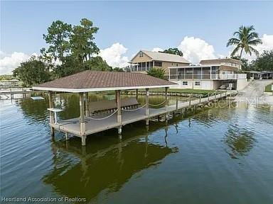 dock area featuring a water view