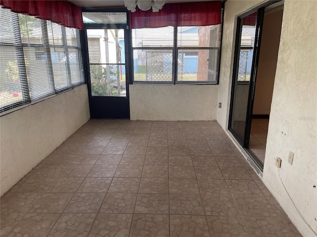 view of unfurnished sunroom