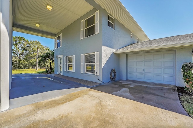 view of home's exterior featuring a garage