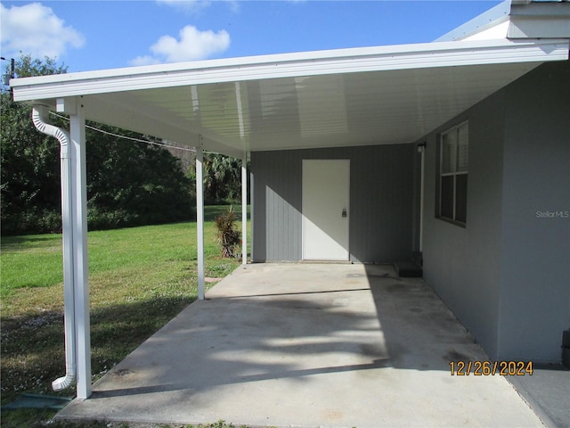 view of patio / terrace featuring a carport