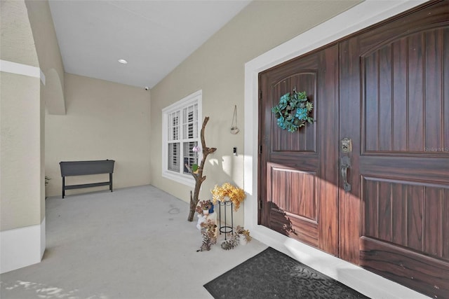 entrance to property featuring a porch