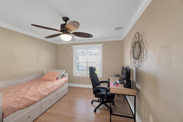 bedroom with ceiling fan, light hardwood / wood-style floors, and ornamental molding