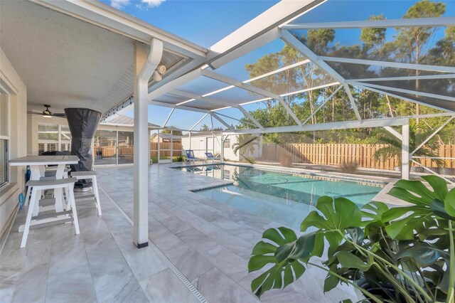 view of pool featuring a patio and a lanai