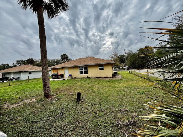 exterior space featuring a lawn