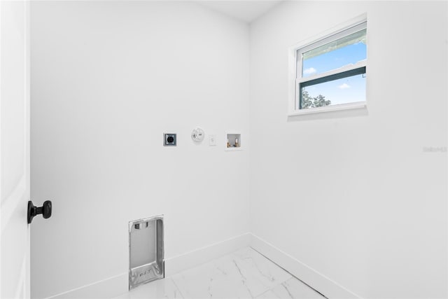 laundry area with electric dryer hookup, hookup for a gas dryer, and hookup for a washing machine