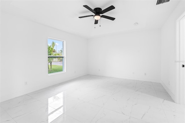 spare room featuring ceiling fan