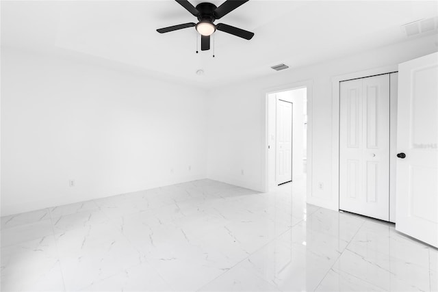 spare room featuring ceiling fan