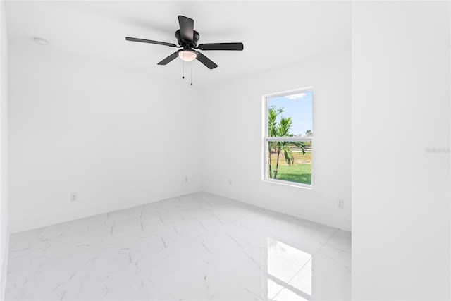 empty room featuring ceiling fan