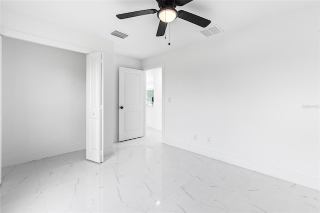 unfurnished room featuring ceiling fan