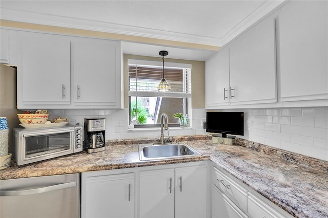 kitchen with white cabinets, stainless steel dishwasher, and sink