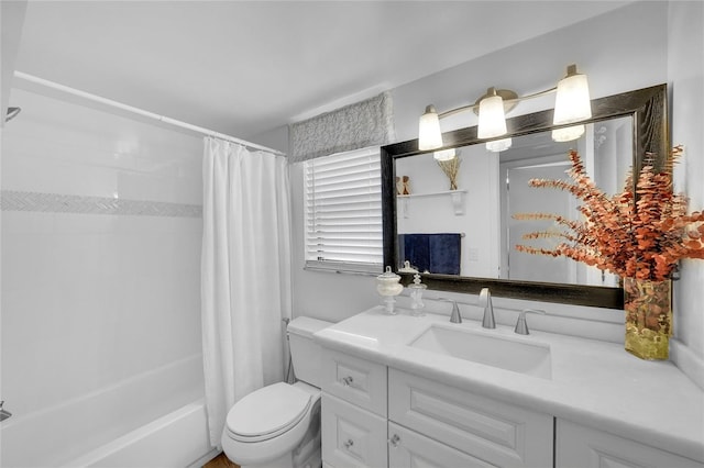 full bathroom featuring vanity, toilet, and shower / tub combo