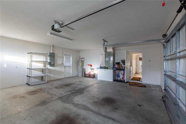 garage featuring heating unit, a garage door opener, electric panel, and water heater