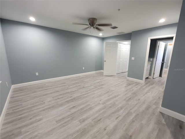 unfurnished room with light hardwood / wood-style flooring and ceiling fan