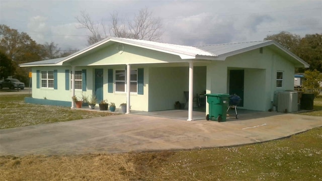 back of property with cooling unit