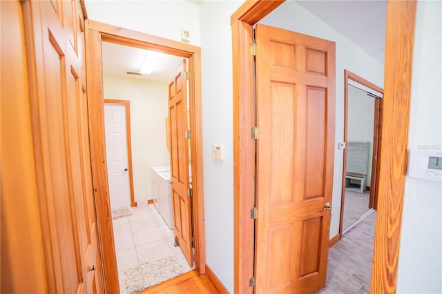 199 S Bear Pointe Dr, Lake Placid, FL 33852 - corridor featuring washer and dryer