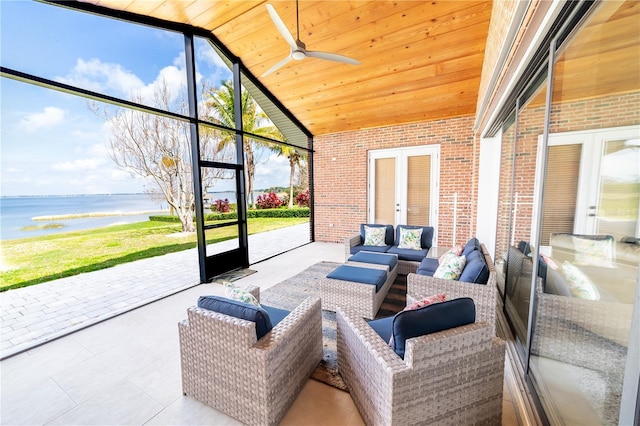 199 S Bear Pointe Dr, Lake Placid, FL 33852 - sunroom / solarium featuring vaulted ceiling, ceiling fan, wood ceiling, a water view, and french doors