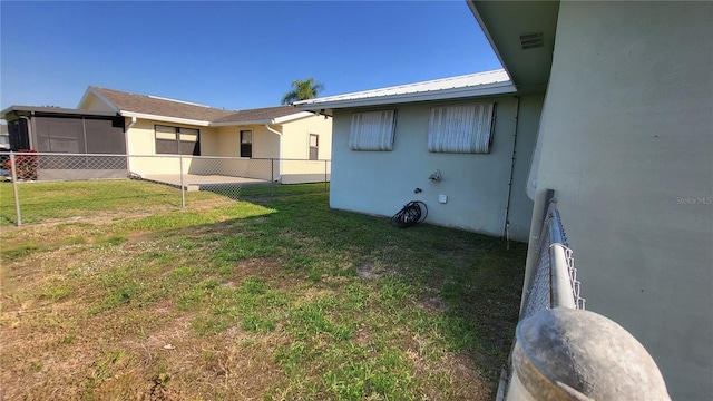 exterior space with a yard