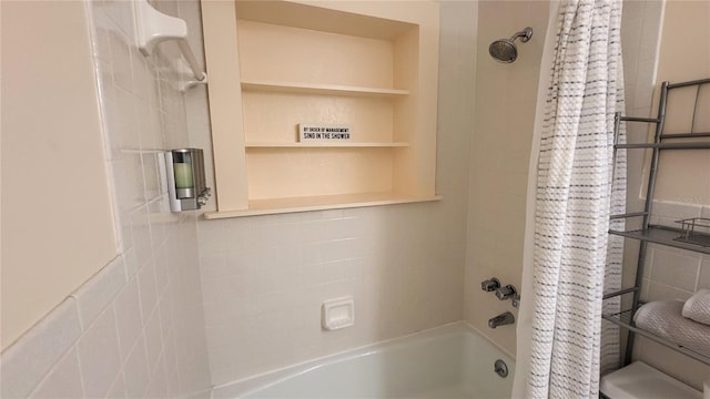 bathroom featuring shower / tub combo with curtain