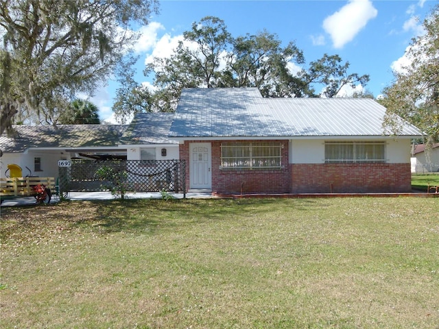 single story home with a front yard