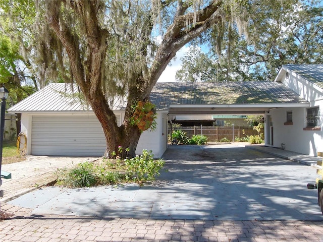 view of front of property with a garage