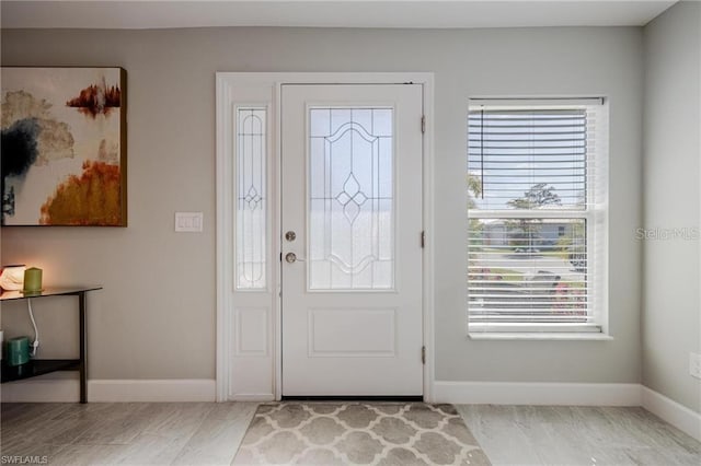 foyer with baseboards