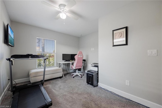 workout area with a ceiling fan, carpet, and baseboards