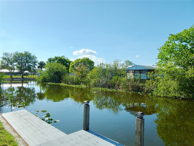 view of dock with a water view