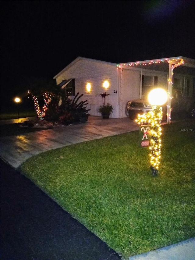 yard at twilight with a patio