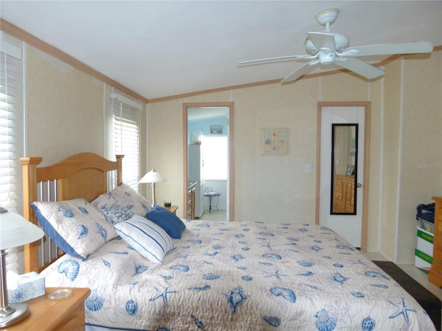 bedroom with ornamental molding and vaulted ceiling