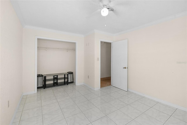 unfurnished bedroom with baseboards, a ceiling fan, a closet, and ornamental molding