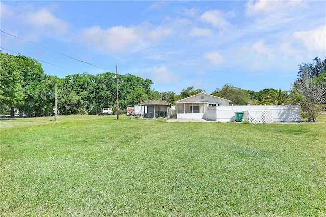 view of yard with fence