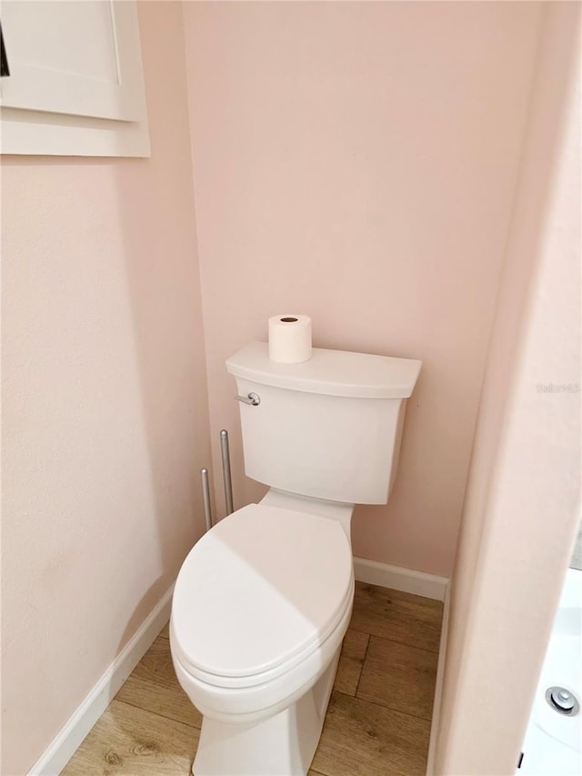 649 SW 34th Cv Unit 392, Okeechobee, FL 34974 - bathroom featuring toilet and wood finished floors