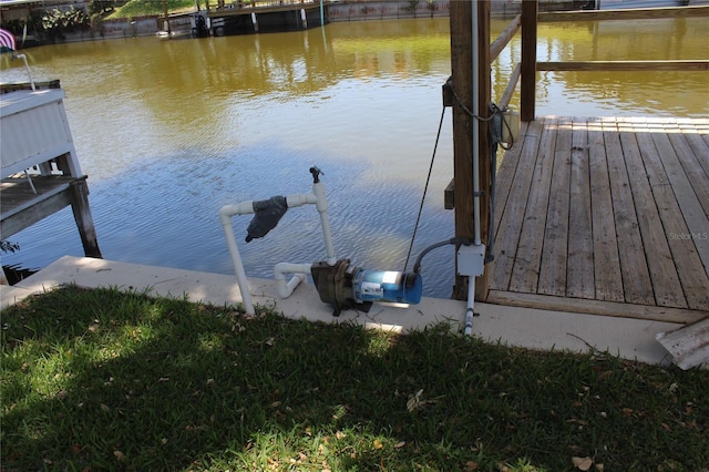 dock area featuring a water view