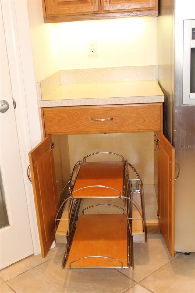 room details featuring freestanding refrigerator