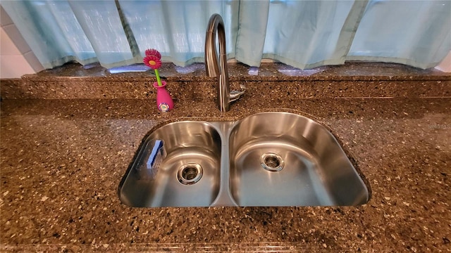 3007 SE 34th Ct, Okeechobee, FL 34974 - room details with dark stone counters and a sink